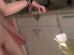 Hot tattooed honey pees in wine glasses and drinks it
