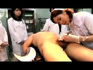 Naughty Oriental doctors working their skillful hands on a 