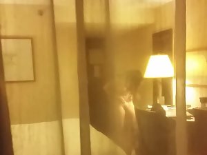 Hotel window voyeur