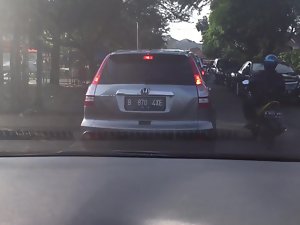 Indonesian Girl Fingered in a Car in Public 