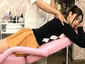 Asian cutie raises her skirt to expose her nice ass during 