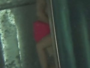 Young couple teasing and fucking underwater in pool