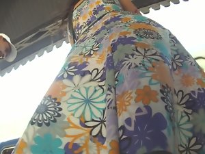 Cutie in a flowery dress makes for hot upskirt magic