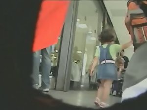 White milf w/ nice ass in a camo skirt gets filmed in upskirt video